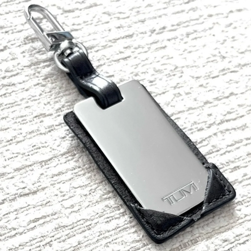 NWOT! TUMI Mirrored Leather Luggage Tag!